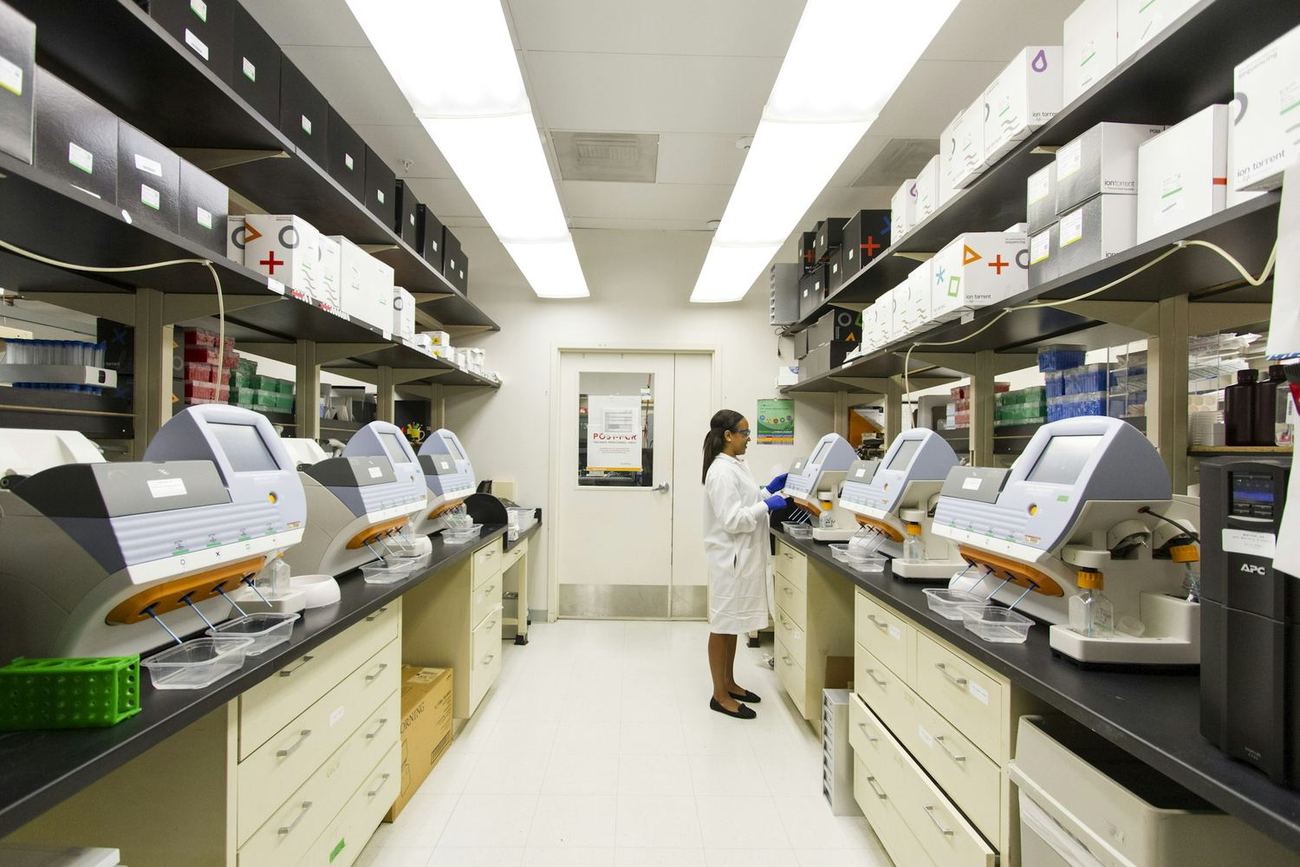A row of laboratory benches and analytical equipment
